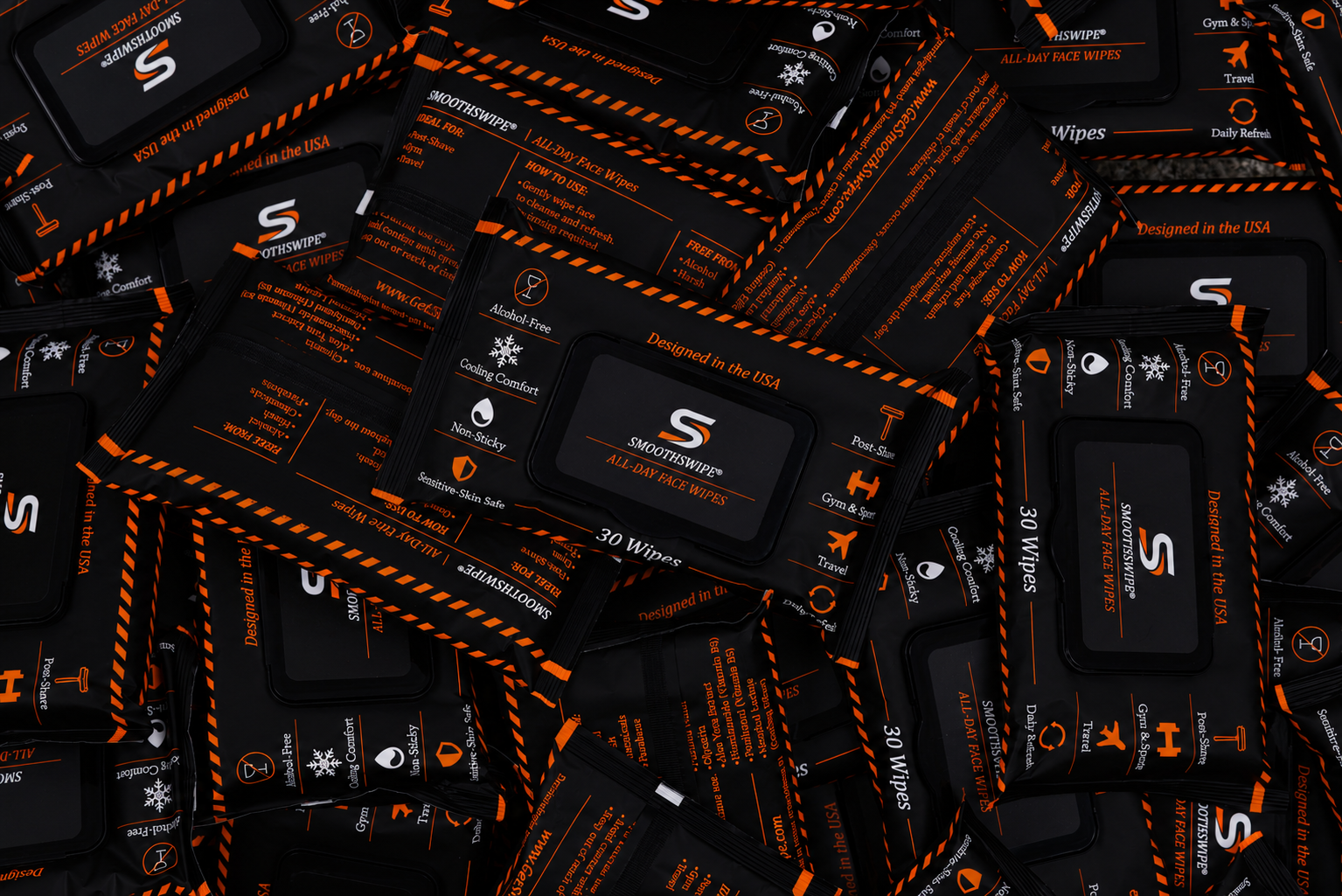 A pile of SmoothSwipe All-Day Face Wipes packs